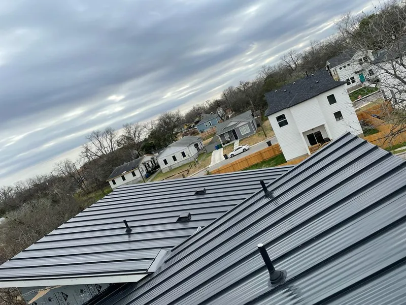 Standing seam metal roof panels with vents for Skylight Repair in Chenango